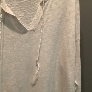 White top . Long sleeve, kangaroo pocket , 100% cotton, never worn.